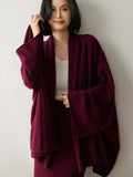Cardigan in cashmere da donna Maglione lavorato a maglia di cashmere a maniche lunghe drappeggiato sul davanti aperto