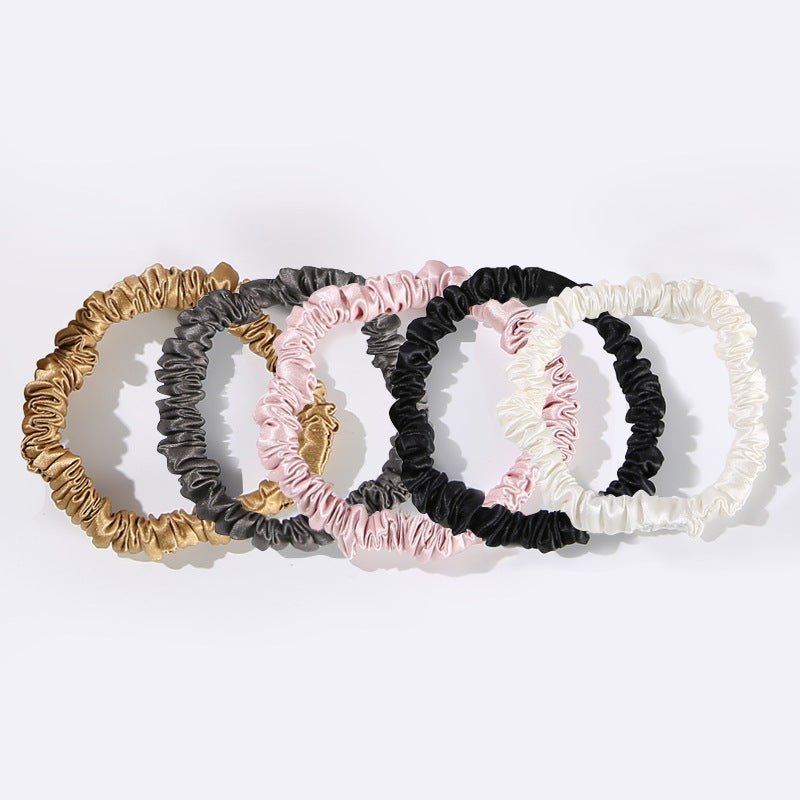 Confezione da 6 elastici per capelli in seta con fiori di piccole dimensioni